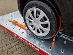 Radspanngurt für Autotransporter mit Lochschienen